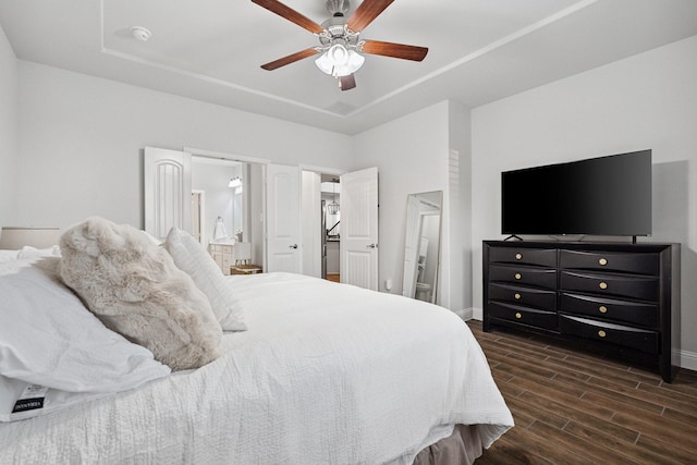 3804 Driftwood Ln, Northlake, TX 76226 - bedroom with dark wood-type flooring, ensuite bathroom, and a ceiling fan