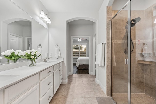 3804 Driftwood Ln, Northlake, TX 76226 - full bath with connected bathroom, double vanity, a stall shower, and a ceiling fan