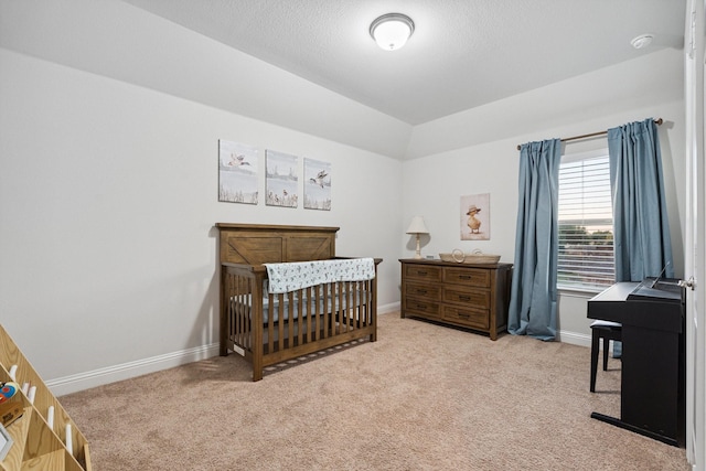 3804 Driftwood Ln, Northlake, TX 76226 - carpeted bedroom featuring a nursery area and lofted ceiling