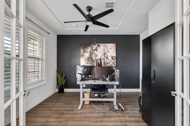 3804 Driftwood Ln, Northlake, TX 76226 - home office featuring wood finished floors, a tray ceiling, and a ceiling fan