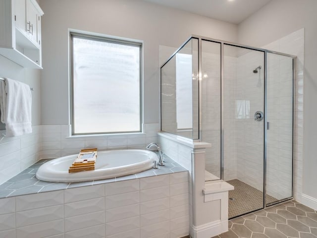 2112 Deer Run, Gunter, TX 75058 - bathroom featuring a shower stall, a garden tub, and tile patterned floors