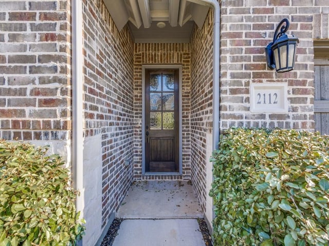 2112 Deer Run, Gunter, TX 75058 - doorway to property featuring brick siding
