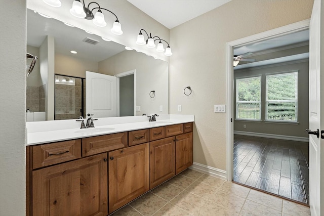 6371 Walnut Hill Ct, Frisco, TX 75036 - full bath with double vanity, ceiling fan, tiled shower, and tile patterned flooring