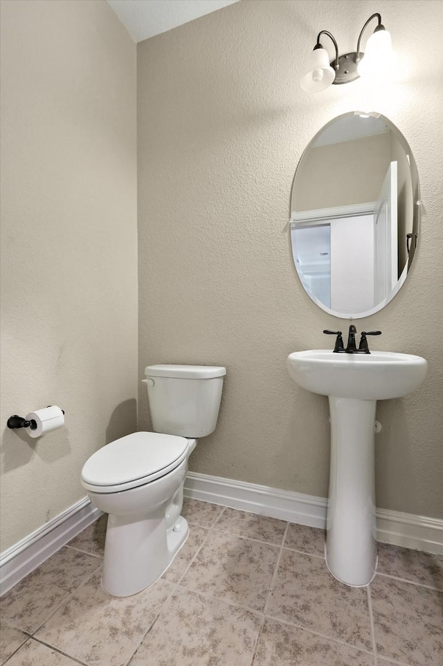 6371 Walnut Hill Ct, Frisco, TX 75036 - bathroom with toilet and tile patterned flooring