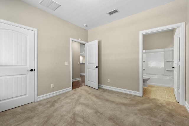 6371 Walnut Hill Ct, Frisco, TX 75036 - unfurnished bedroom featuring carpet flooring and connected bathroom