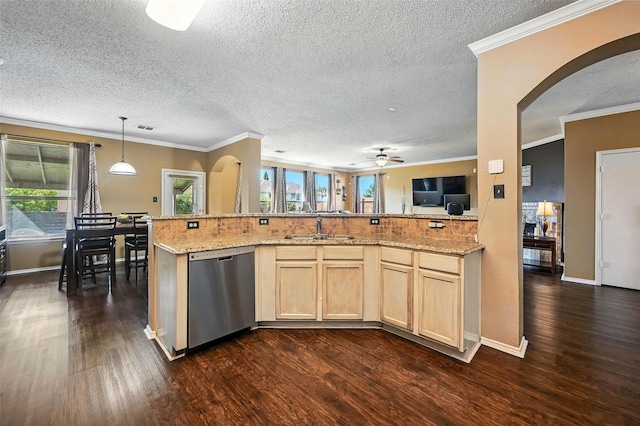 1906 Walnut Hills Ln, Mansfield, TX 76063 - kitchen with stainless steel dishwasher, arched walkways, a textured ceiling, light brown cabinets, and crown molding