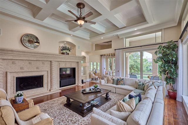 5 Savannah Ridge Dr, Frisco, TX 75034 - living area featuring a premium fireplace, coffered ceiling, ceiling fan, ornamental molding, and beamed ceiling