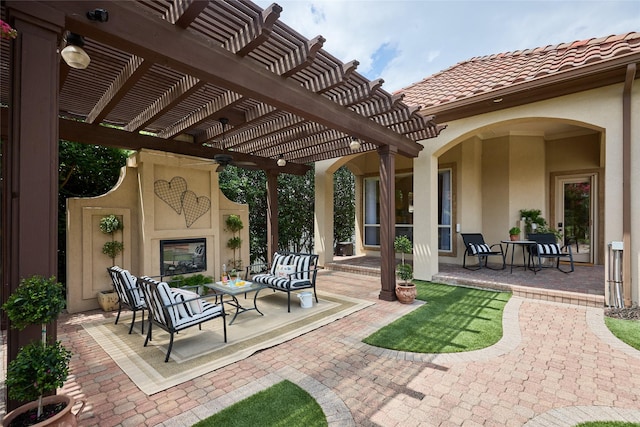 5 Savannah Ridge Dr, Frisco, TX 75034 - view of patio with a fireplace, a pergola, and a ceiling fan