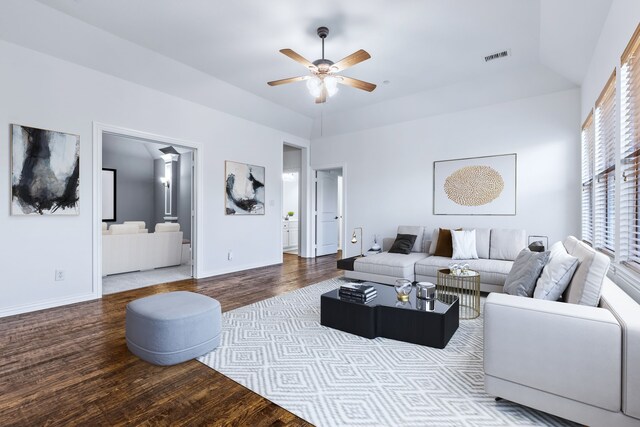 4205 Midpark Ln, Plano, TX 75074 - living area with ceiling fan, wood finished floors, and a raised ceiling