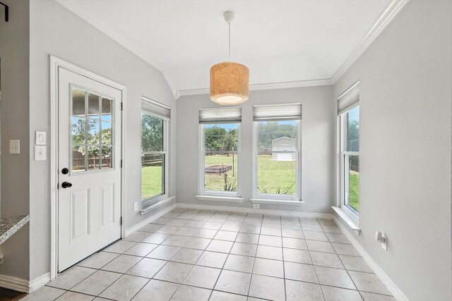 638 Lakeshore Blvd, Oak Point, TX 75068 - unfurnished dining area featuring crown molding, healthy amount of natural light, light tile patterned flooring, and vaulted ceiling