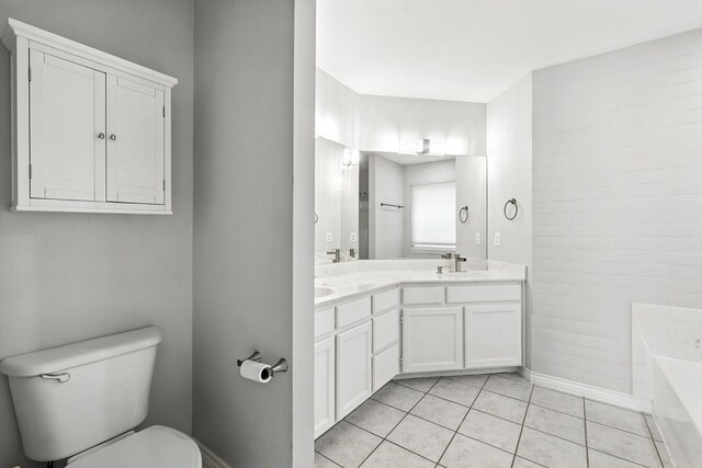 638 Lakeshore Blvd, Oak Point, TX 75068 - bathroom featuring double vanity, a tub to relax in, and tile patterned floors