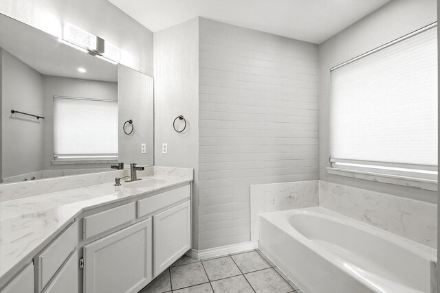638 Lakeshore Blvd, Oak Point, TX 75068 - bathroom with vanity, a garden tub, and tile patterned flooring
