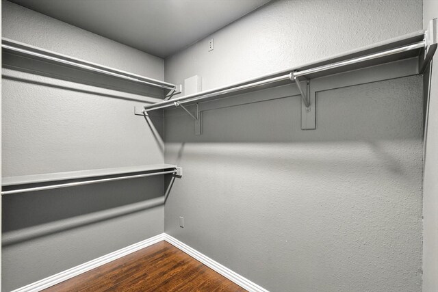 638 Lakeshore Blvd, Oak Point, TX 75068 - spacious closet featuring dark wood-style flooring