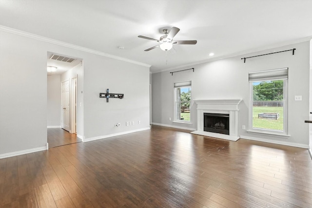 638 Lakeshore Blvd, Oak Point, TX 75068 - unfurnished living room featuring ceiling fan, a fireplace with raised hearth, wood-type flooring, and ornamental molding