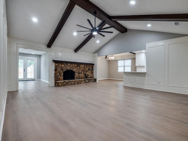 1044 Peach Ln, Desoto, TX 75115 - unfurnished living room with ceiling fan, recessed lighting, a fireplace, and light wood-style flooring