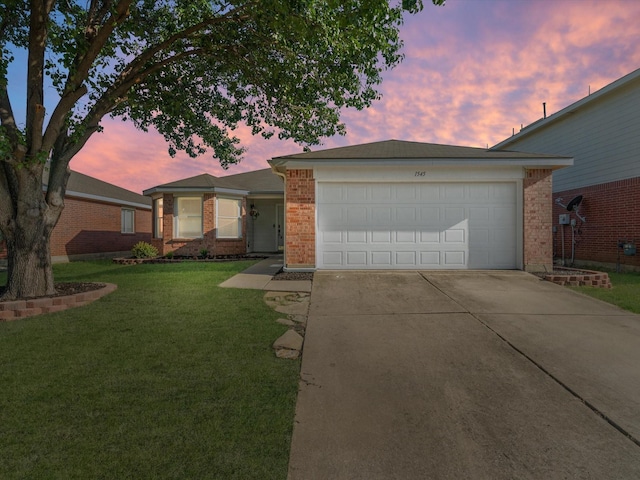 1545 Knottingham Dr, Little Elm, TX 75068 - single story home with brick siding, concrete driveway, a yard, and an attached garage
