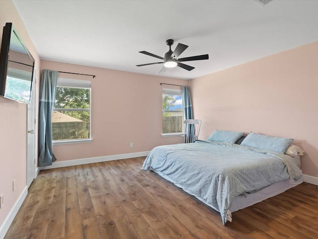 1545 Knottingham Dr, Little Elm, TX 75068 - bedroom with wood finished floors and ceiling fan