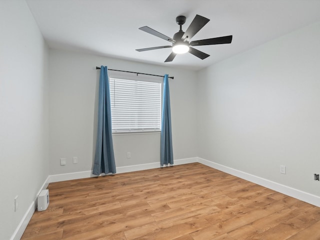 1545 Knottingham Dr, Little Elm, TX 75068 - unfurnished room featuring light wood finished floors and a ceiling fan