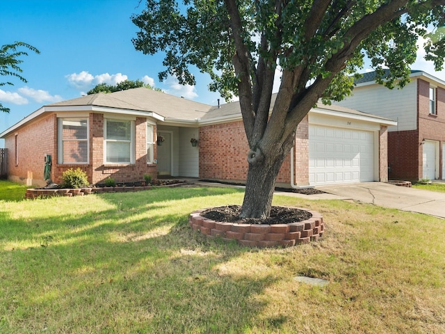 1545 Knottingham Dr, Little Elm, TX 75068 - view of front facade featuring brick siding, driveway, an attached garage, and a front yard