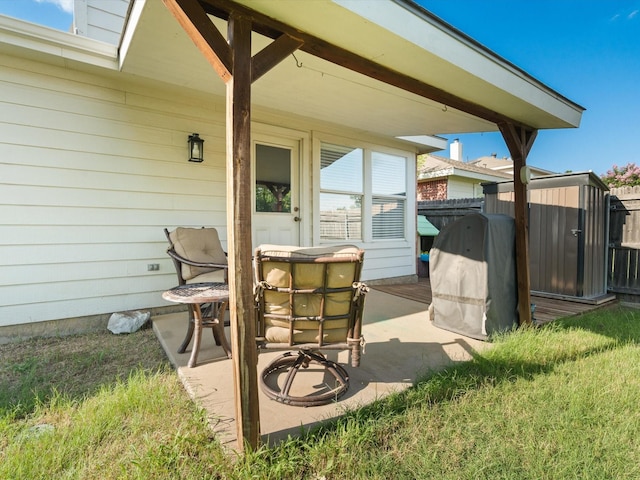 1545 Knottingham Dr, Little Elm, TX 75068 - view of patio / terrace with a storage unit
