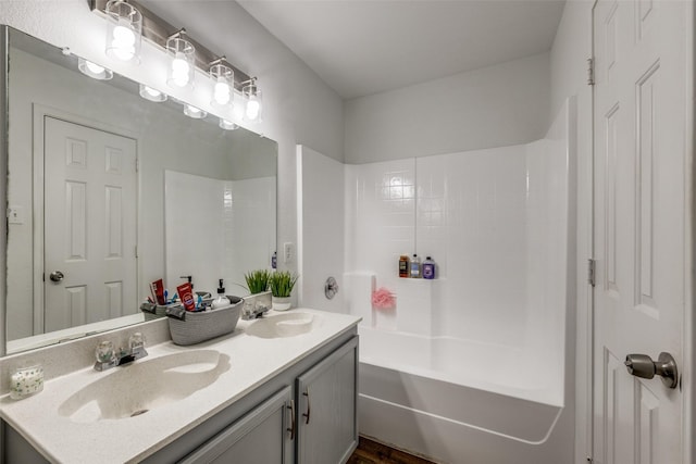 8426 Jacaranda Way, Arlington, TX 76002 - bathroom featuring double vanity and tub / shower combination