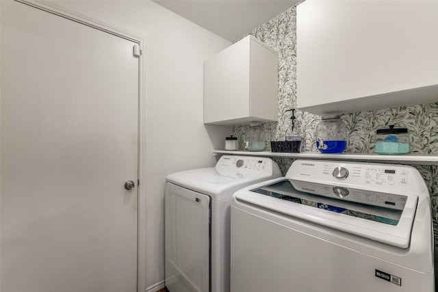 8426 Jacaranda Way, Arlington, TX 76002 - laundry room with cabinet space, washing machine and clothes dryer, and wallpapered walls