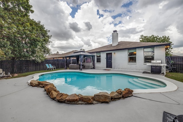 8426 Jacaranda Way, Arlington, TX 76002 - view of swimming pool with a gazebo, a patio area, a fenced backyard, and grilling area