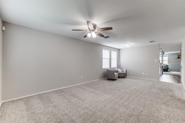 8426 Jacaranda Way, Arlington, TX 76002 - empty room with ceiling fan, plenty of natural light, and carpet floors