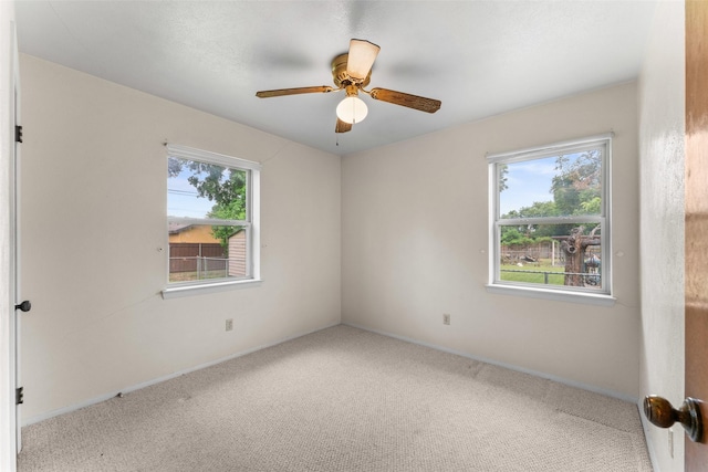 1238 Caladium Dr, Mesquite, TX 75149 - carpeted spare room featuring ceiling fan and baseboards