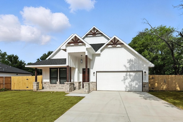 3836 Burnice Dr, Fort Worth, TX 76119 - view of front of home with stone siding, an attached garage, concrete driveway, a porch, and a shingled roof