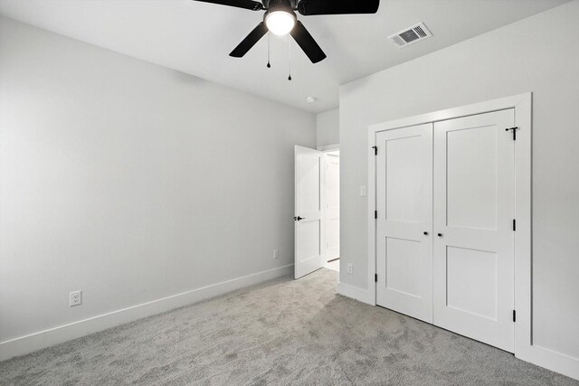 3836 Burnice Dr, Fort Worth, TX 76119 - unfurnished bedroom with carpet, a closet, and ceiling fan