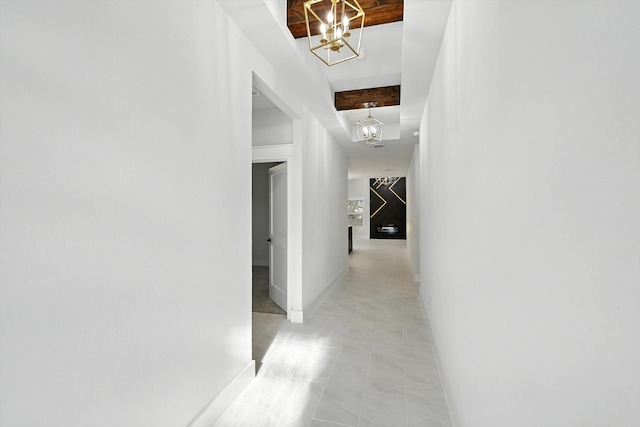 3836 Burnice Dr, Fort Worth, TX 76119 - hallway with a chandelier, light tile patterned floors, and beam ceiling