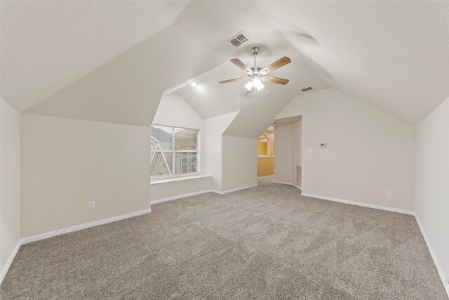 14779 Blakehill Dr, Frisco, TX 75035 - additional living space with carpet, vaulted ceiling, and ceiling fan