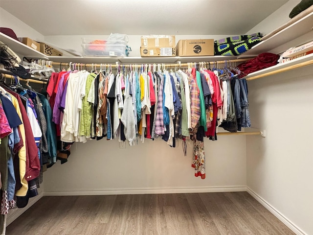 614 Torero Dr, Oak Point, TX 75068 - walk in closet featuring wood finished floors