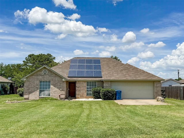 614 Torero Dr, Oak Point, TX 75068 - traditional-style home with roof mounted solar panels, brick siding, an attached garage, roof with shingles, and driveway