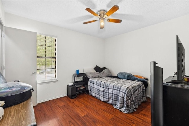 4900 Highbank Dr, Arlington, TX 76018 - bedroom with wood finished floors and ceiling fan
