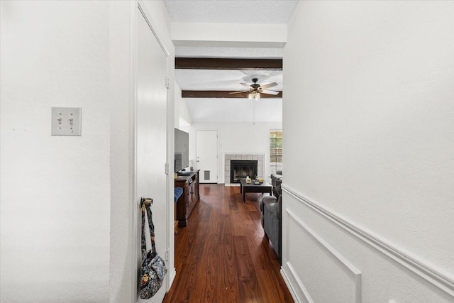 4900 Highbank Dr, Arlington, TX 76018 - hallway with beam ceiling and dark wood-style floors
