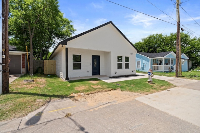 301 Henry St, Waxahachie, TX 75165 - view of front of house with brick siding and covered porch