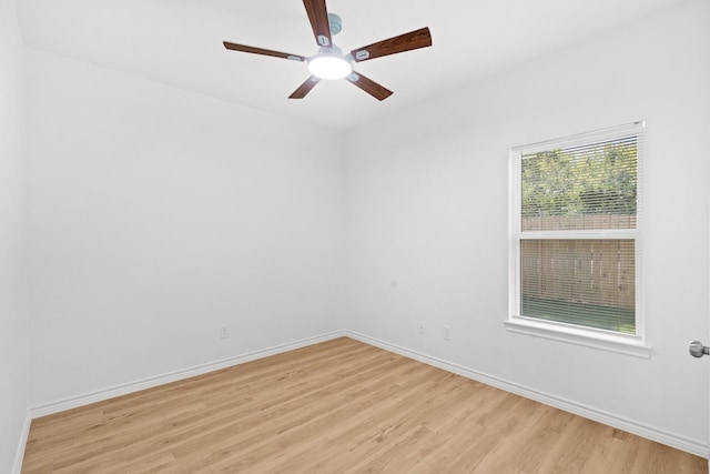 301 Henry St, Waxahachie, TX 75165 - empty room featuring light wood-style floors and a ceiling fan
