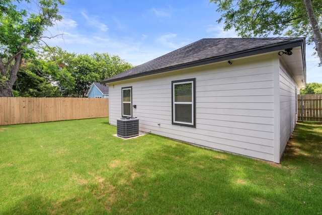 301 Henry St, Waxahachie, TX 75165 - rear view of property featuring roof with shingles and a fenced backyard