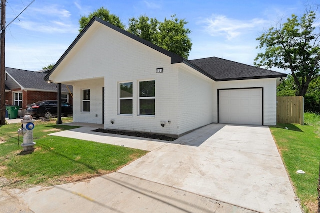 301 Henry St, Waxahachie, TX 75165 - view of front of house with brick siding, an attached garage, and concrete driveway