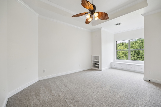 8012 Rushing Spring Dr, North Richland Hills, TX 76182 - empty room with carpet floors, ornamental molding, a ceiling fan, and a raised ceiling