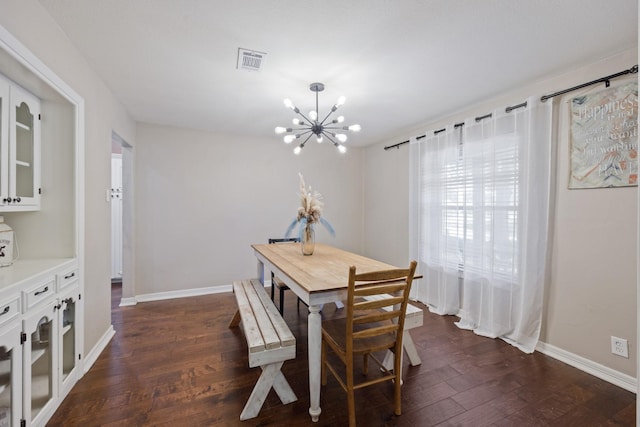 1507 Greenbrier Dr, Sherman, TX 75092 - dining area with a chandelier and dark wood-style floors