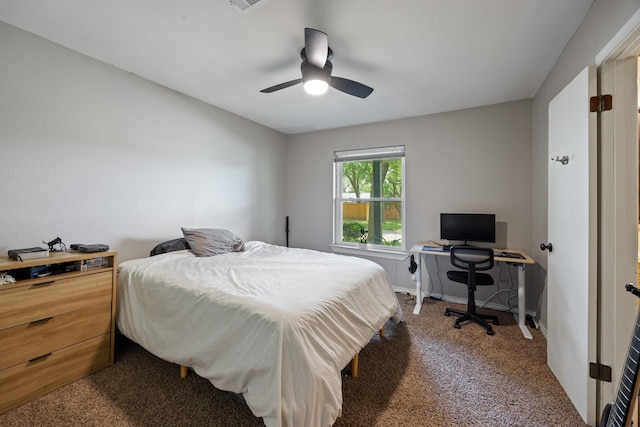 1507 Greenbrier Dr, Sherman, TX 75092 - carpeted bedroom with a ceiling fan and a desk