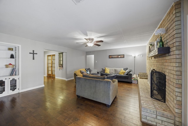 1507 Greenbrier Dr, Sherman, TX 75092 - living area featuring dark wood-style floors, ceiling fan, and a fireplace