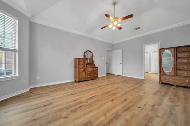 6814 Galway Dr, Garland, TX 75044 - unfurnished bedroom featuring multiple windows, light wood finished floors, vaulted ceiling, ornamental molding, and a ceiling fan