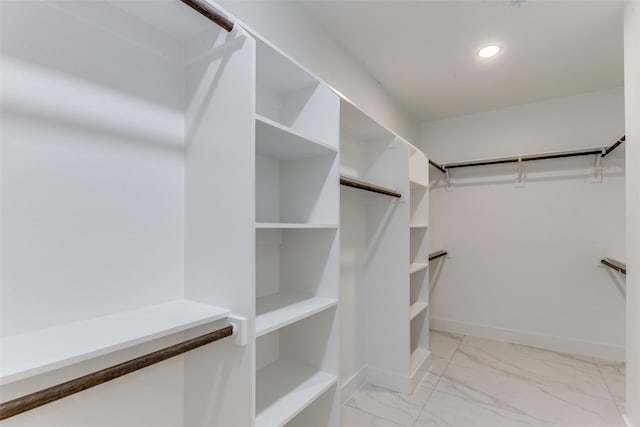5223 Fletcher Ave, Fort Worth, TX 76107 - spacious closet featuring light marble finish flooring
