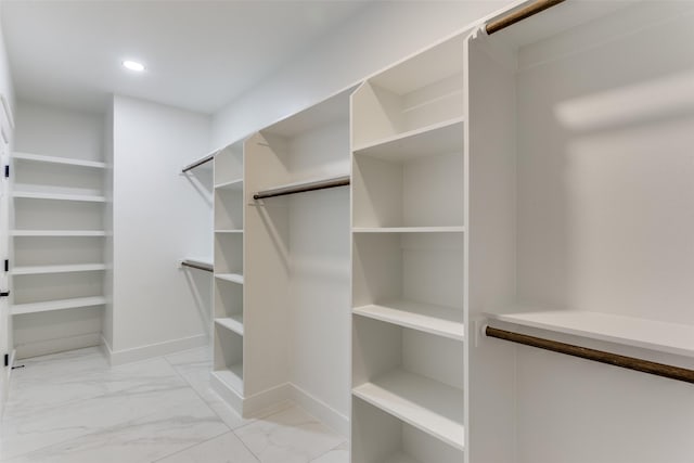 5223 Fletcher Ave, Fort Worth, TX 76107 - walk in closet featuring light marble finish floors