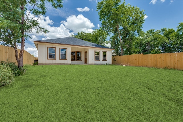 5223 Fletcher Ave, Fort Worth, TX 76107 - back of house featuring a fenced backyard and a shingled roof