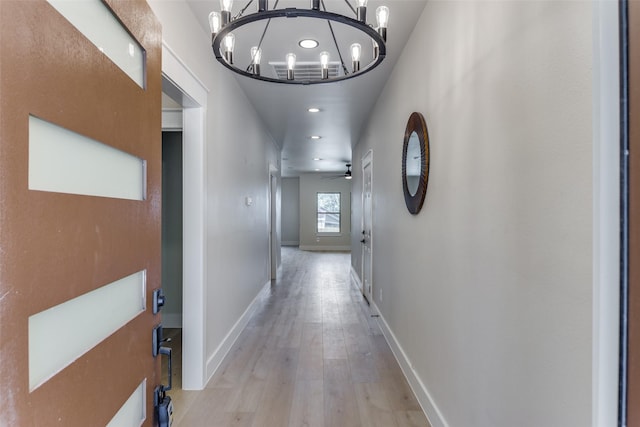 5223 Fletcher Ave, Fort Worth, TX 76107 - corridor with a chandelier, light wood-type flooring, and recessed lighting